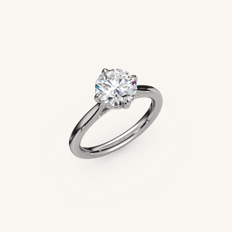 The Solienne – Cathedral Solitaire Hidden Halo Engagement Ring (E-W)