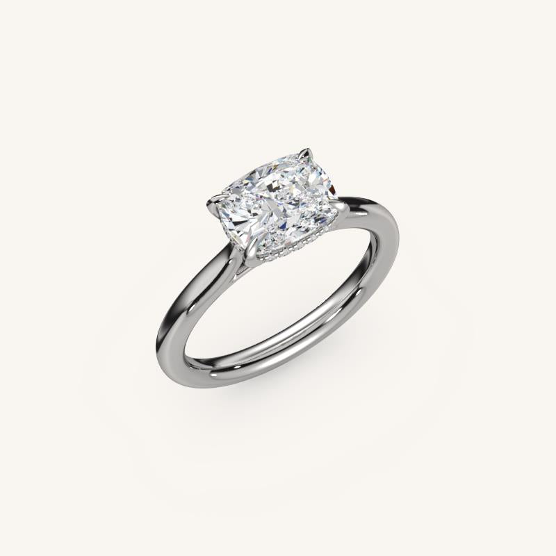 The Solienne – Cathedral Solitaire Hidden Halo Engagement Ring (E-W)