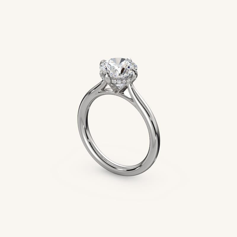 The Solienne – Cathedral Solitaire Hidden Halo Engagement Ring (E-W)