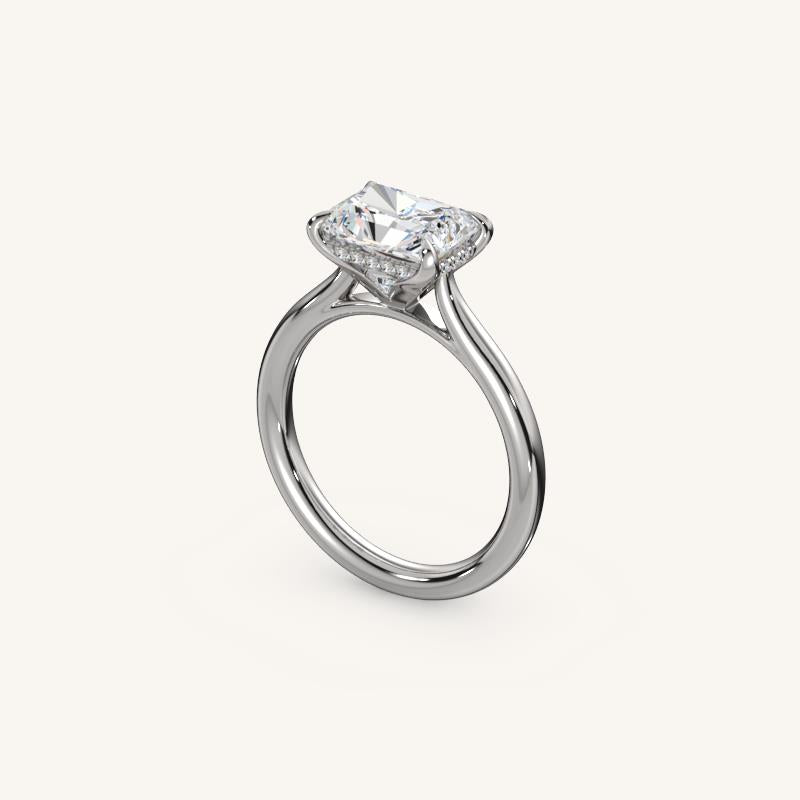 The Solienne – Cathedral Solitaire Hidden Halo Engagement Ring (E-W)