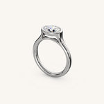 Load image into Gallery viewer, The Lunea – Floating Bezel Solitaire Engagement Ring (E-W)
