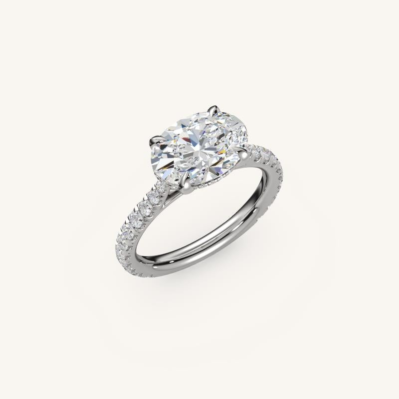The Solienne – Cathedral Solitaire Hidden Halo Engagement Ring (E-W)