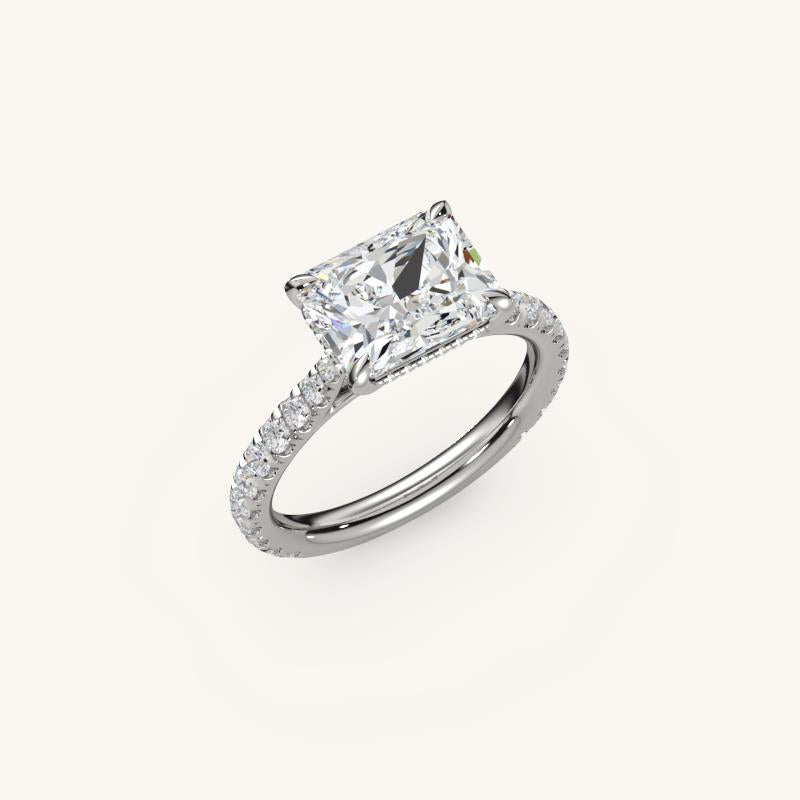 The Solienne – Cathedral Solitaire Hidden Halo Engagement Ring (E-W)